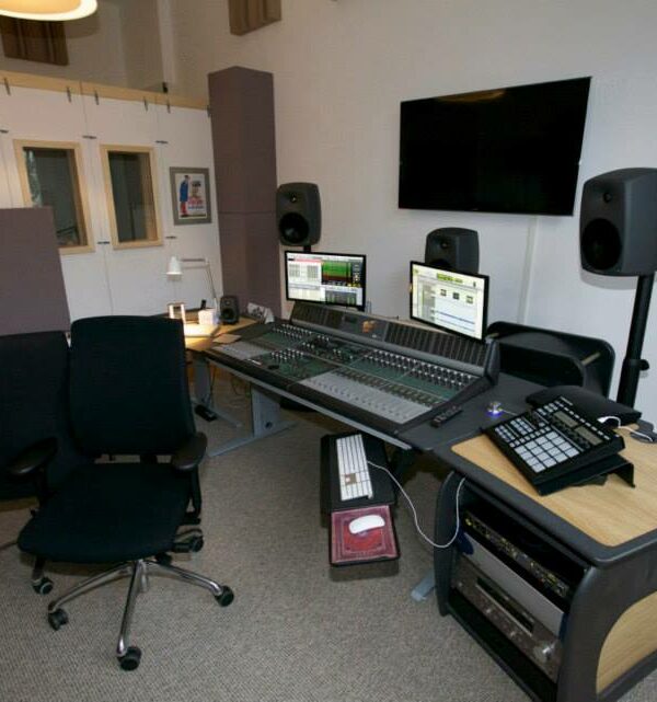 Soffit bass traps and movable acoustic panels in mastering room