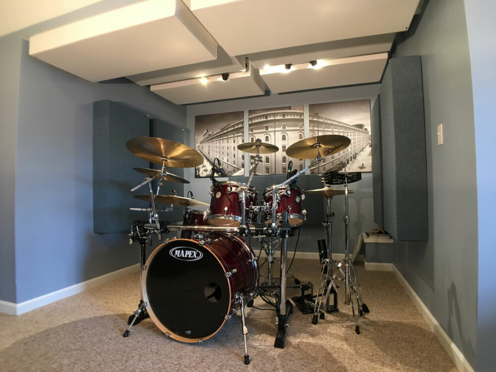 Recording drums acoustic panel placement GIK Acoustics 244 bass traps on the ceiling and monster traps in Michael Bell studio makes the drum kit sound tighter