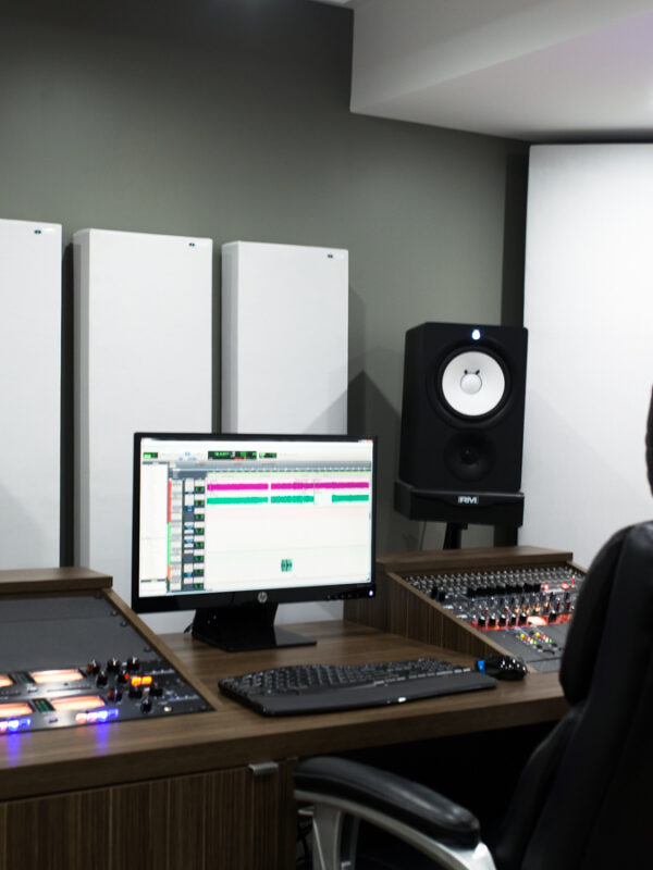 Recording Studio Acoustics using GIK Acoustics at Mike Evo's Studio by placing Acoustic panels behind the monitor and corner bass traps in front of the listening position to absorb low end and SBIR